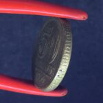 50 Centavos  1956  Bronze-Alumínio   MBC  (módulo reduzido)  Série Armas da República - Imagem 3